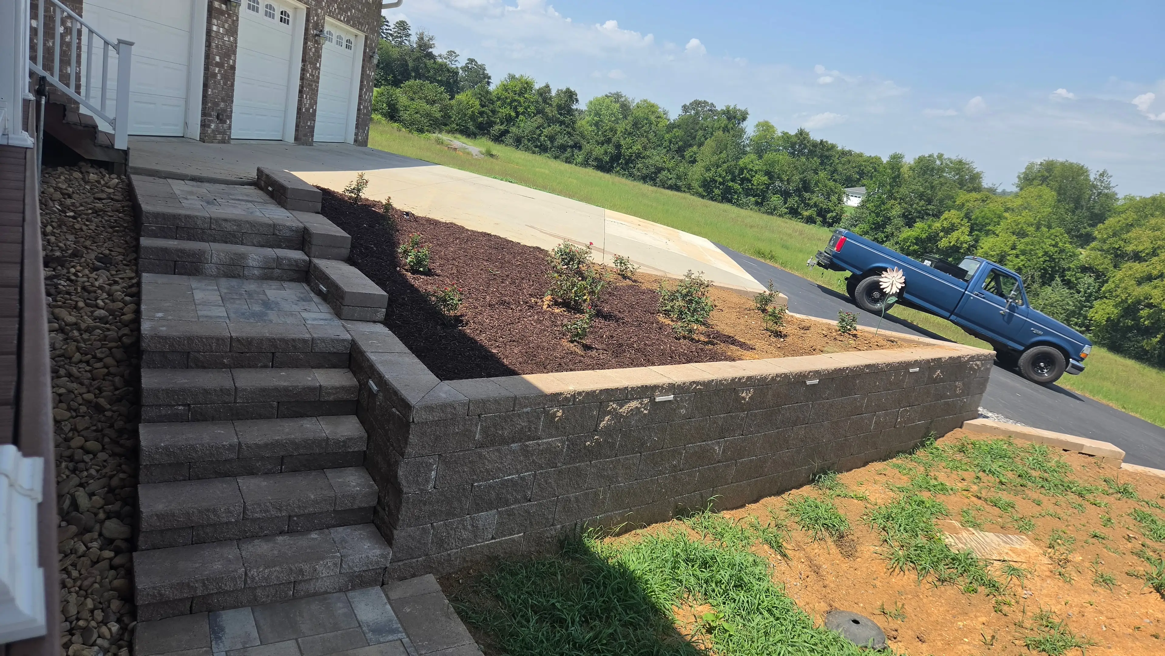 Completed retaining wall and landscaping project by Constructive Landscaping in Knoxville, TN